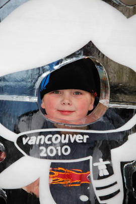 Day 52 Young boy enjoying Ice Vancouver 2010 Mascot in St. Catharines, Ontario