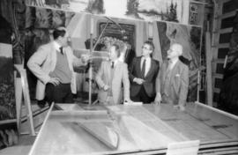 Mike Harcourt, Ferdinand Petrov, unidentified man and Fraser Wilson in front of mural