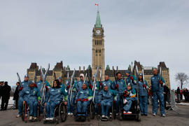 Day 1 Paralympic Torchbearers pose in front of Parliament Hill, Ottawa, Ont.