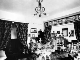 [Interior of a house showing the drawing room]
