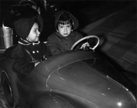 Children on amusement ride in P.N.E. Kiddieland