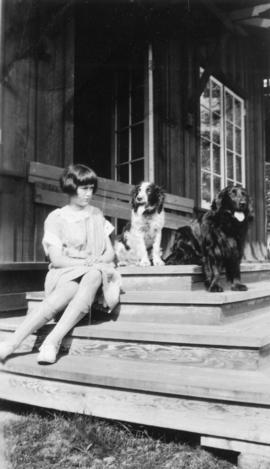 Young woman with two English Springer Spaniels