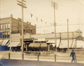 [A B.C.E.R. road sprinkler in front of the Arcade on Hastings Street]