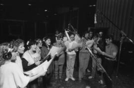 Group in recording studio at Griffiths Gibson Productions