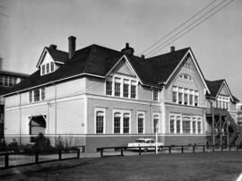 Exterior of Fairview High School of Commerce at 1540 West Broadway