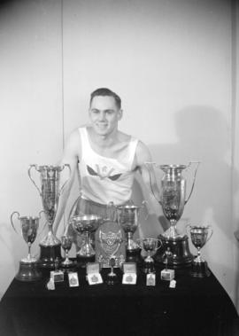 Stan Barrett [and his trophies]