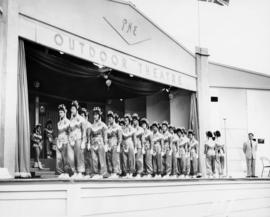 Female performance group on stage