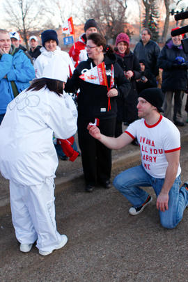 Day 80 Torchbearer 19 Ivanka Zecevic is proposed to after her torch run in Medicine Hat, Alberta.