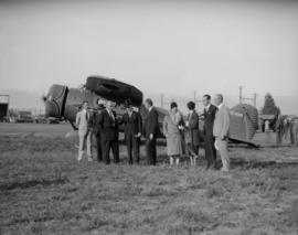 Pacific International Airways arrival of Fleetster aircraft at airport [Mayor Malkin in top hat]