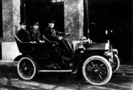 [Chief Carlisle and Deputy Chief Thompson seated in first automobile provided for Fire Chief, dri...