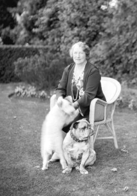 [Mrs. J.W. Fordham - Johnson and her two dogs]