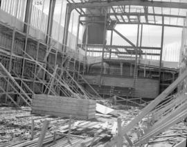 Interior view of west end of pulp warehouse showing forms ready for first lift pour