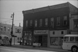 [600-608 Main Street - Tom's Grocery, furniture store, and Lantern Café]