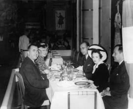 War time sugar board, Mr. Noble and Jack Hobbins and others seated at a restaurant