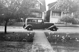 [Hudson parked on street in front of 3628 West 3rd Avenue]