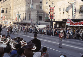 48th Grey Cup Parade, on Georgia and Howe, men and women on horseback and Calgary banner