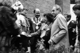 Mike Harcourt and group assembled in front of Castle Vancouver