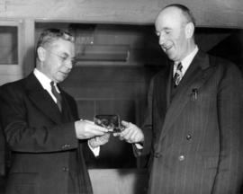 Charles E. Thompson receiving an award