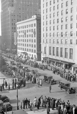 Funeral procession of Mayor Charles Tisdall travelling east on Georgia St. after funeral at Chris...