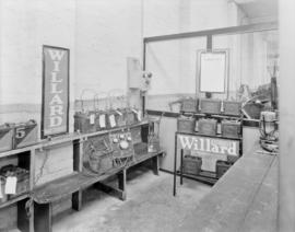 Willard Storage Batteries [Interior of shop showing batteries on shelves]