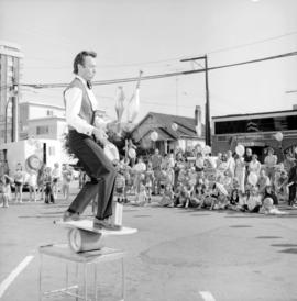 [A preview of the] International Circus [in the Shoppers Drug Mart parking lot in Kerrisdale]