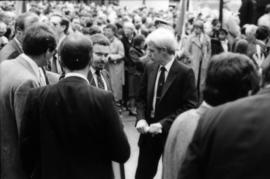 Group of unidentified men assembled outside of Castle Vancouver