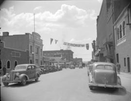[View of Seymour Street looking south with an Orpheum movie banner hanging across the street]