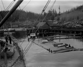 [Boat approaching] Pacific Mills [dock on the] Queen Charlotte Islands