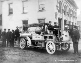 [1909 Seagrave Chemical Wagon and firefighters beside Firehall No. 1, Gore at Cordova Streets]