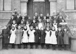 [A class on the steps of Central School]