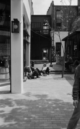 [Group of people relaxing in the sun] in Gastown