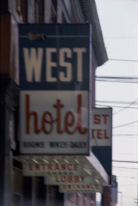 [Sign for West Hotel at 444 Carrall Street]