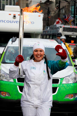 Day 106 Torchbearer 49 Chastity Davis carries the flame in Vancouver, British Columbia.