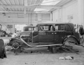 J. E. Foster & Co. Insurance adjusters - Damaged car at Cheeseman's Garage, Howe St.