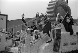 [Rotary Club float in parade]