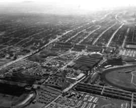 Aerial view of P.N.E. grounds and surrounding area looking southwest