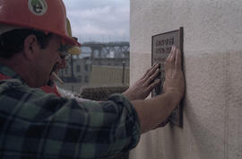 Installation of Burrard Bridge Painting Plaque