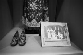 Victoria Yip's wedding gown and shoes on display at the Saltwater City exhibit