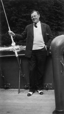 Eric W. Hamber with fishing rod aboard the Vencedor