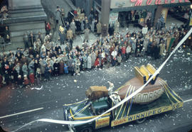 43rd Grey Cup Parade, on Granville Street, Winnipeg Blue Bombers float and spectators