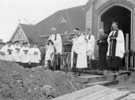 Canon George H. Wilson and Reverend Cecil C. Owen presiding over cornerstone service for St. Phil...
