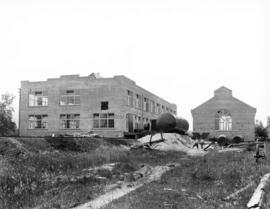 Gregory Tire & Rubber Co. [under construction - exterior]