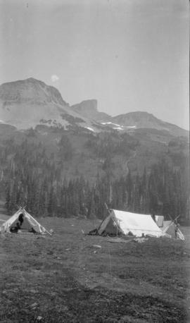 B.T. [Douglas?] [View of three camping tents and mountain in background]