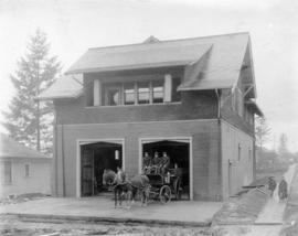 [Horse-drawn wagon and firefighters in front of Firehall No. 11 at 12th Avenue and St. Catherines...