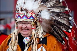 Day 78 Chief wears an Olympic Torch Relay beaded necklace at Hobbema's Flame Blessing in Alberta.