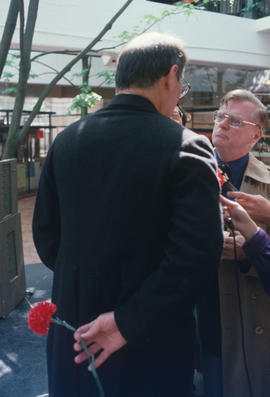 Mike Harcourt speaking to media at the reenactment of the first city council meeting at 12 Water ...