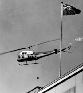 [Helicopter landing on the roof of the Post office - 349 West Georgia Street]