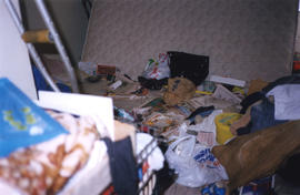 Garbage in Columbia Hotel room at 303 Columbia Street
