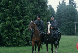 Two police officers on horseback during the Centennial Canada Day celebration