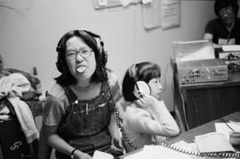 A Pender Guy volunteer at an on-air broadcast from Strathcona Community Centre